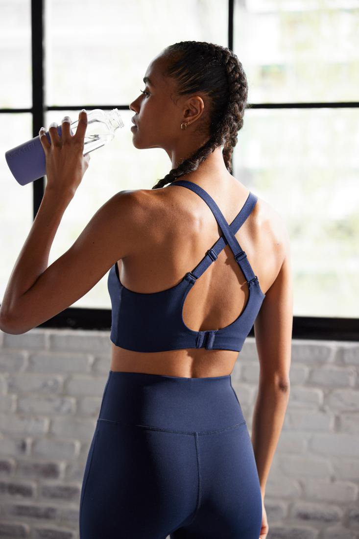 Ysabel Mora 70802 Sports Bra - Navy Blue sports bra with removable pads, adjustable criss-cross straps and double hook and eye closures.