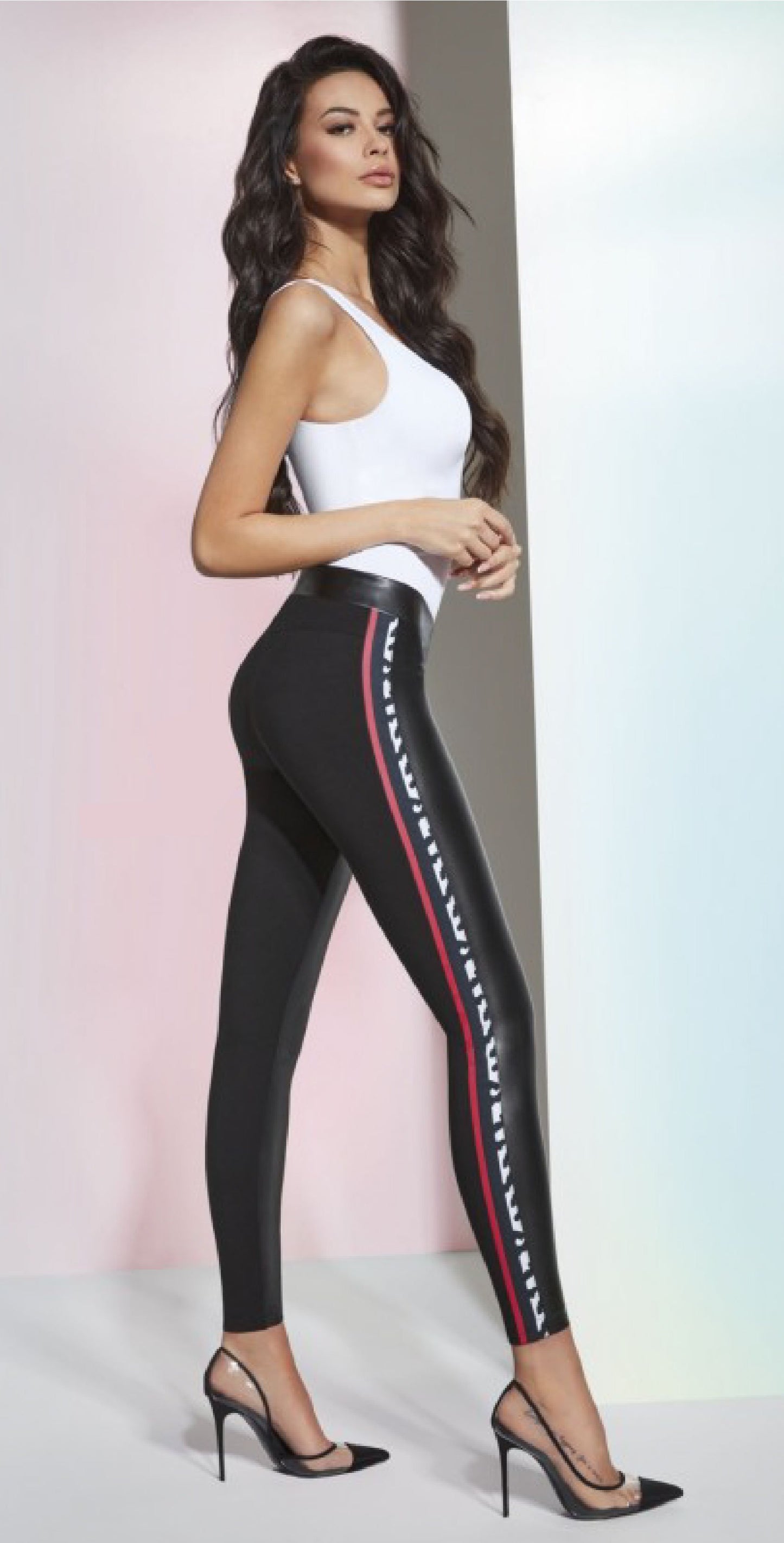 BasBlack Caroline Leggings - Black leggings in 2 fabrics, the front is faux leather and the back is in a plain stretch viscose fabric. They also features a side sports style stripe in red and black and white animal print.