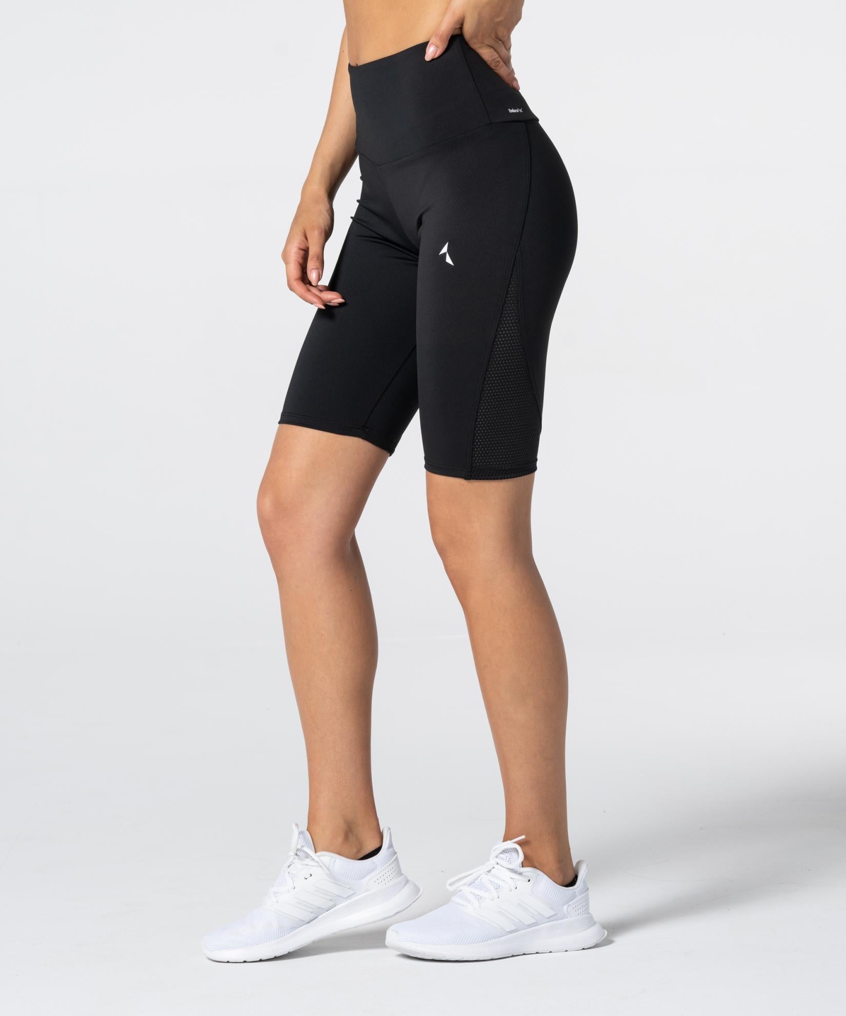 Carpatree Side Mesh Biker Shorts - Black high waisted bicycle shorts with a deep waist band and side mesh panelling. Made of strong stretch fabric composed of quick-drying and breathable polyester.