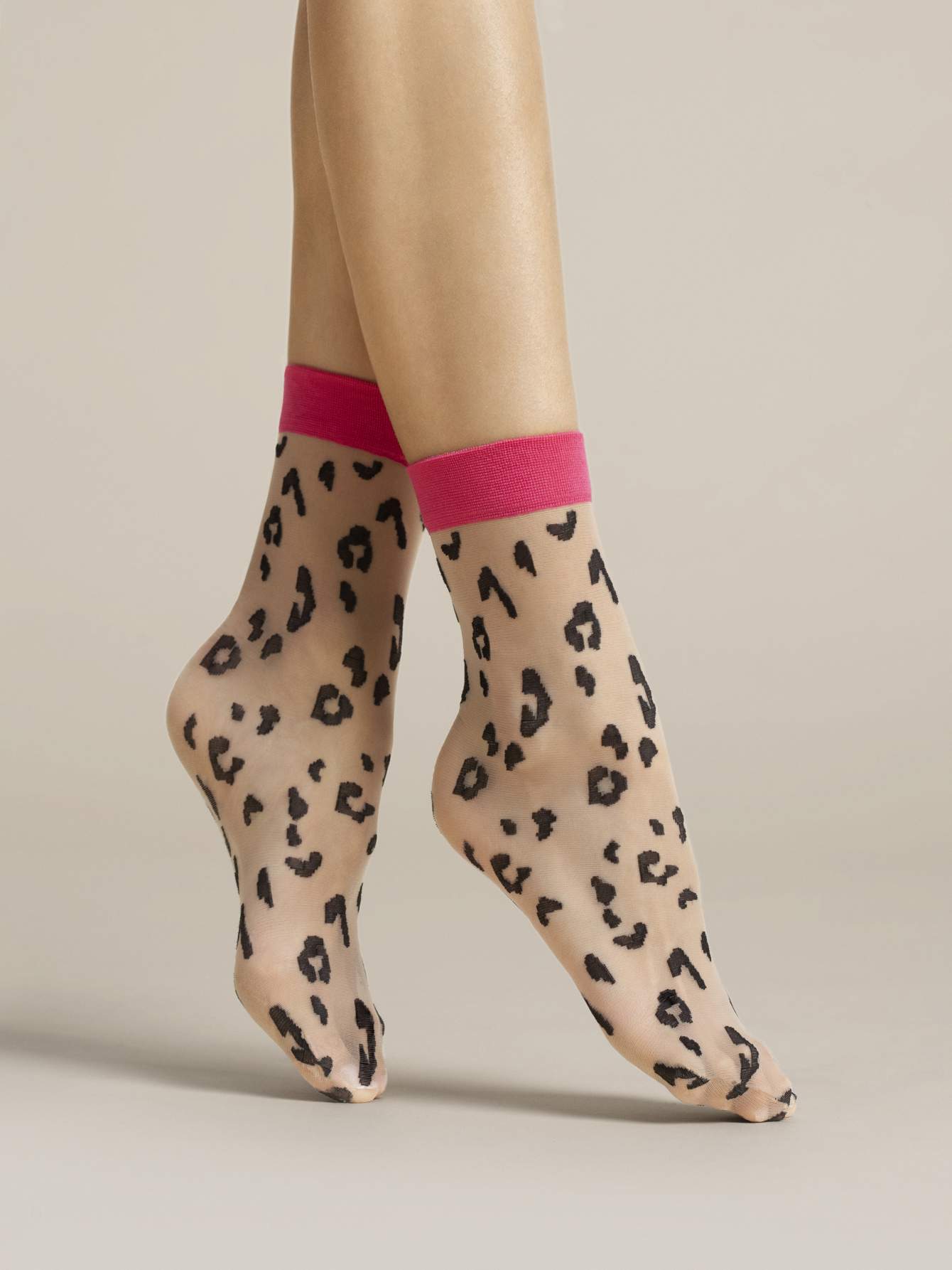 Fiore Amalia Sock - Sheer nude fashion ankle socks with a woven black leopard print pattern and pink cuff.