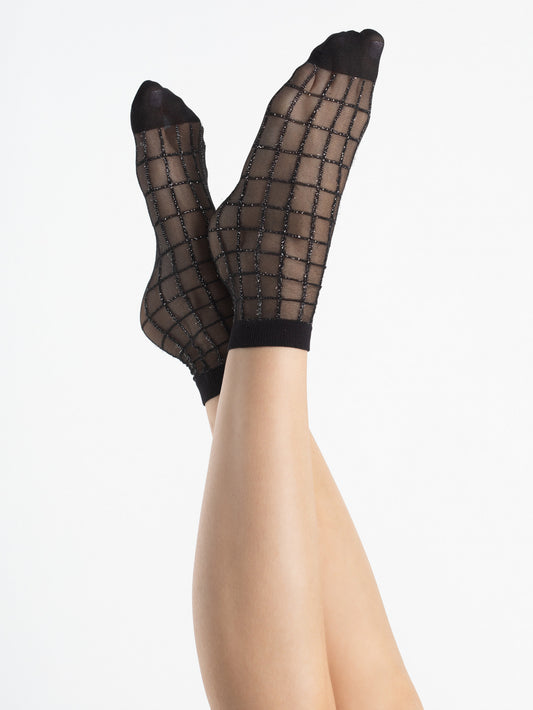 Fiore Grid Sock - Sheer black fashion ankle socks with a woven sparkly silver and black square grid pattern, opaque toe and plain cuff.