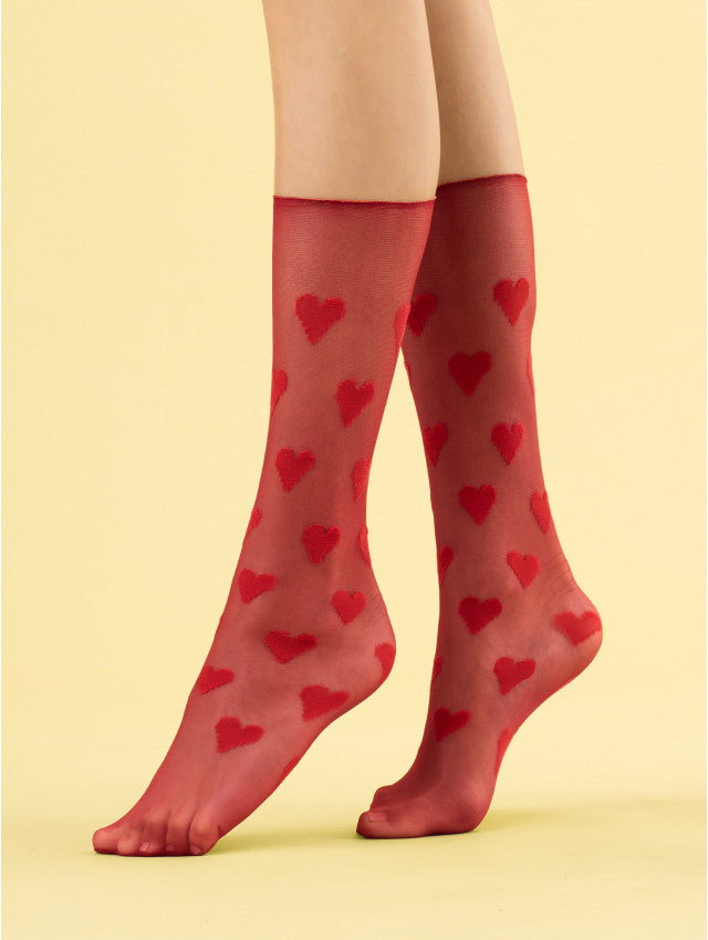 Fiore Love Me Sock - Sheer red fashion knee-high socks with woven red heart pattern and deep comfort.
