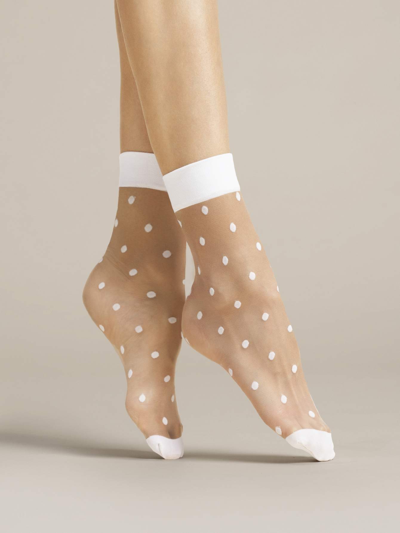 Fiore Papavero Sock - Sheer nude fashion ankle socks with woven white spot pattern and white cuff and toe.