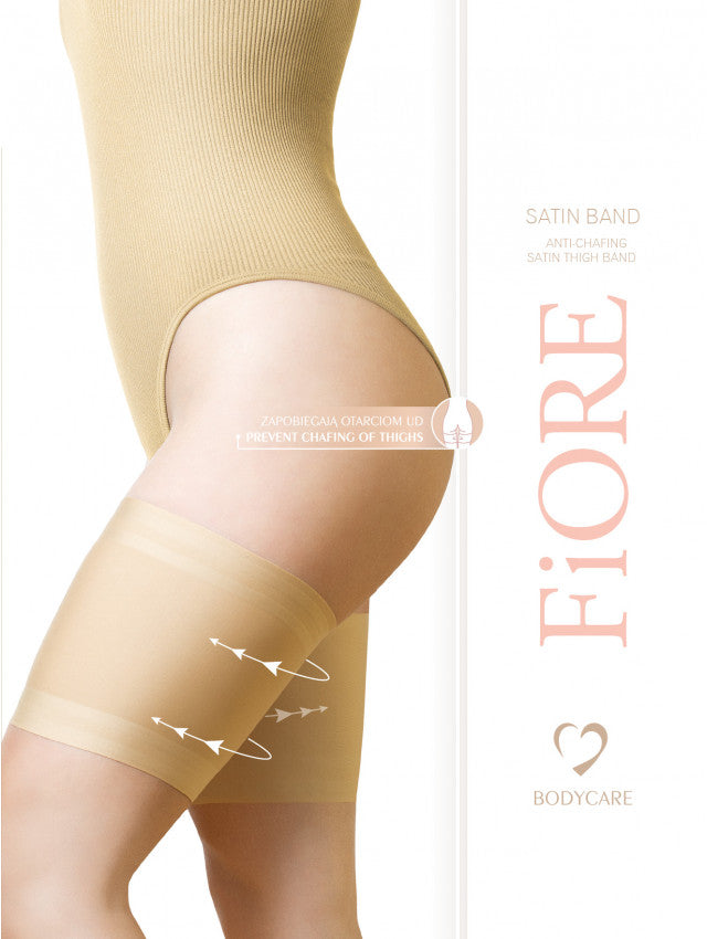 Fiore Satin Band - Plain nude anti-chafing thigh bands made of strong, stretchy yarns. The perfect accessory to avoid thigh rubbing (chub rub), allowing you to wear dresses and skirts during summer days and evenings. Made of plain smooth light satin fabric, these anti-chafing thigh bands have double inner silicone stripes (top and bottom) to help keep them in place.