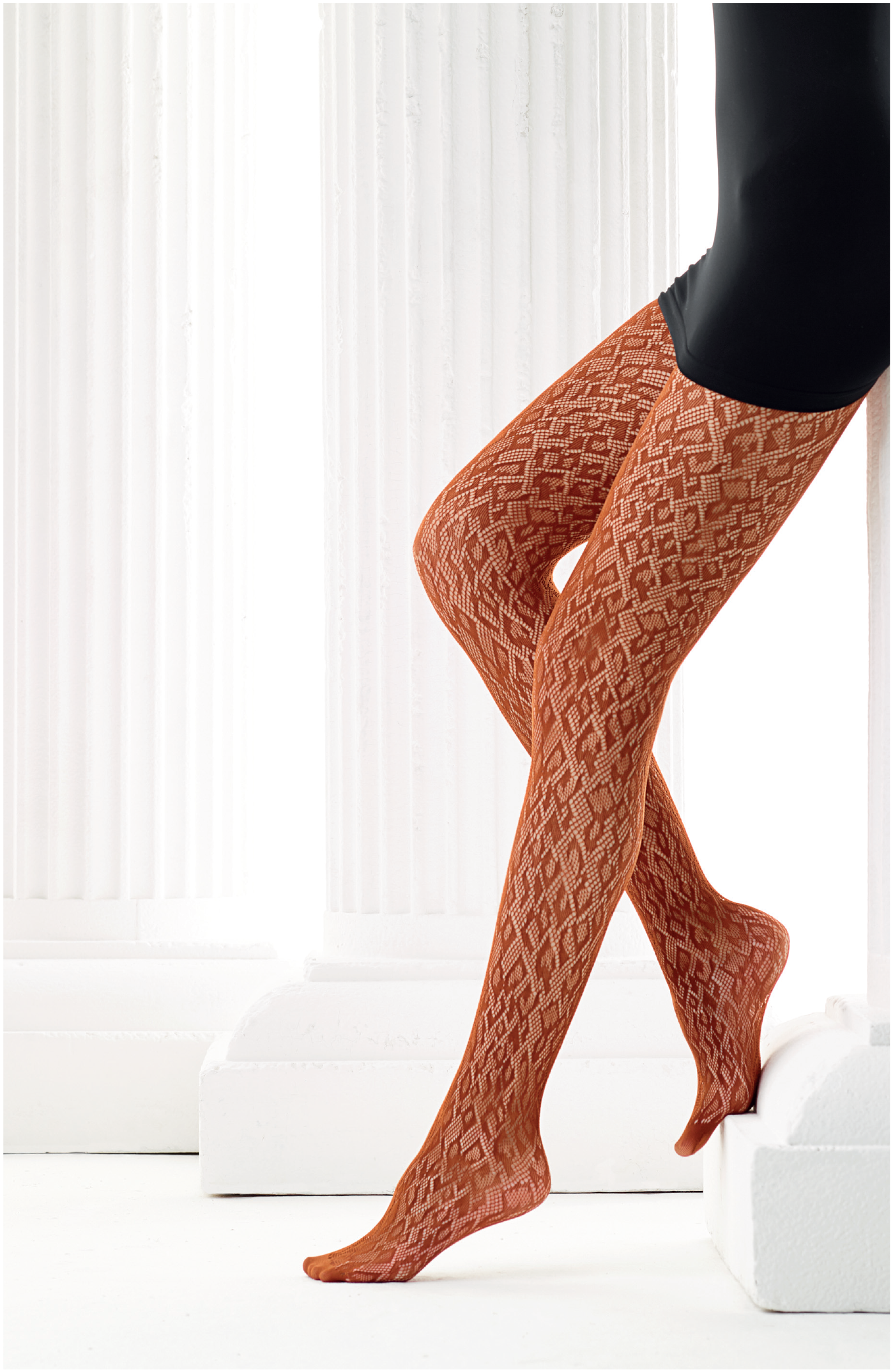 Omero Leomi collant - Soft rusty brown openwork tights with a leopard print pattern with a geometric twist.