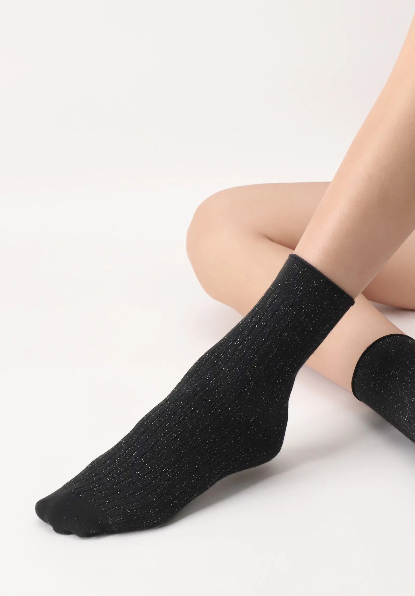 OroblÌ_ Bright Rib Sock - Soft and warm black ribbed knitted ankle socks with sparkly silver lurex throughout.