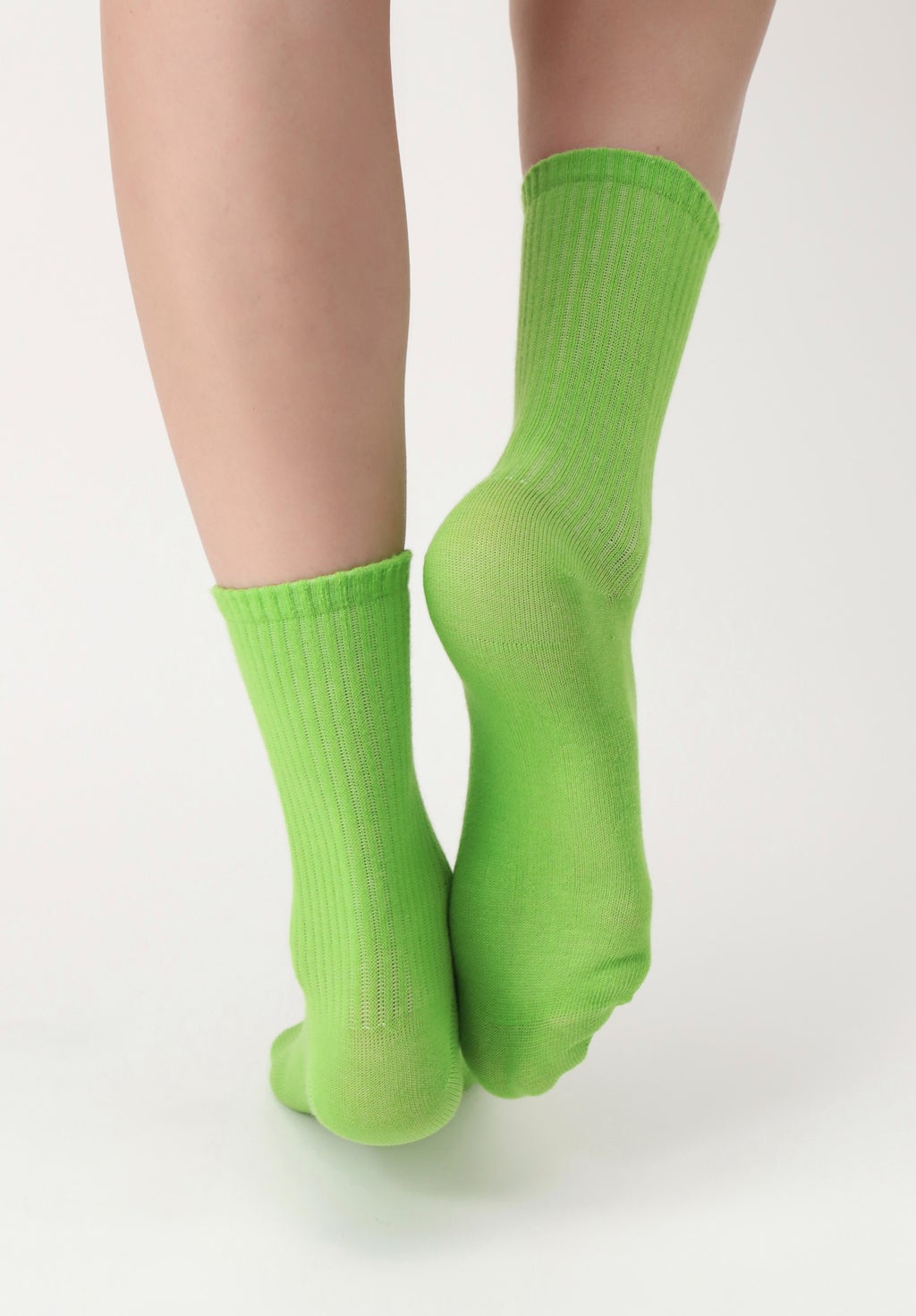 OroblÌ_ Color Block Twin Socks - Ribbed cotton mix bootie ankle high socks twin pack with shaped heel. One pair is white with lime green, blue and purple lines on the back and the other is a plain bright bold lime green colour.