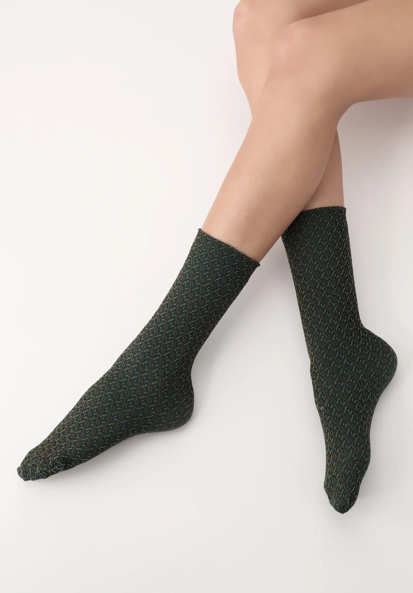 OroblÌ_ Jacquard Texture Sock - Soft opaque fashion ankle socks with a black background a jacquard style pattern of lines, dashes and specks in rust brown, khaki military green dark.