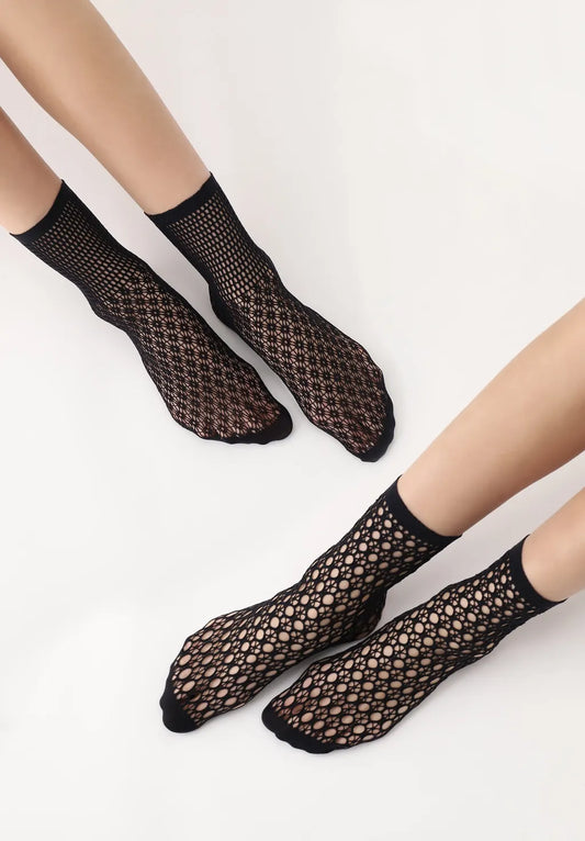 Oroblù Twin Mesh Sock - Two pack of black openwork fishnet ankle socks, one pair is a circular crochet style and the other is a floral mesh style with a smaller net around the ankle, both have a plain opaque toe.