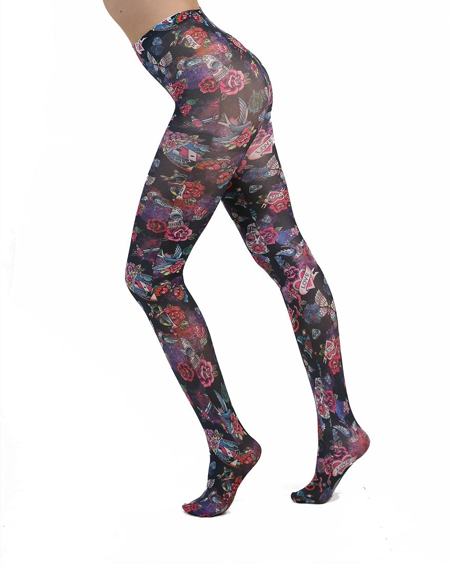 Pamela Mann Sugar Skulls Tights - White opaque tights with an all over multicoloured day of the dead style tattoo print of skulls, roses, hearts, daggers, butterflies, owls, jewels etc. on a black background, perfect for Halloween.