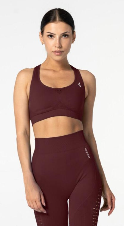 Carpatree Phase Seamless Bra - Burgundy seamless sports bra with removable padding and razor back with crochet style detail.