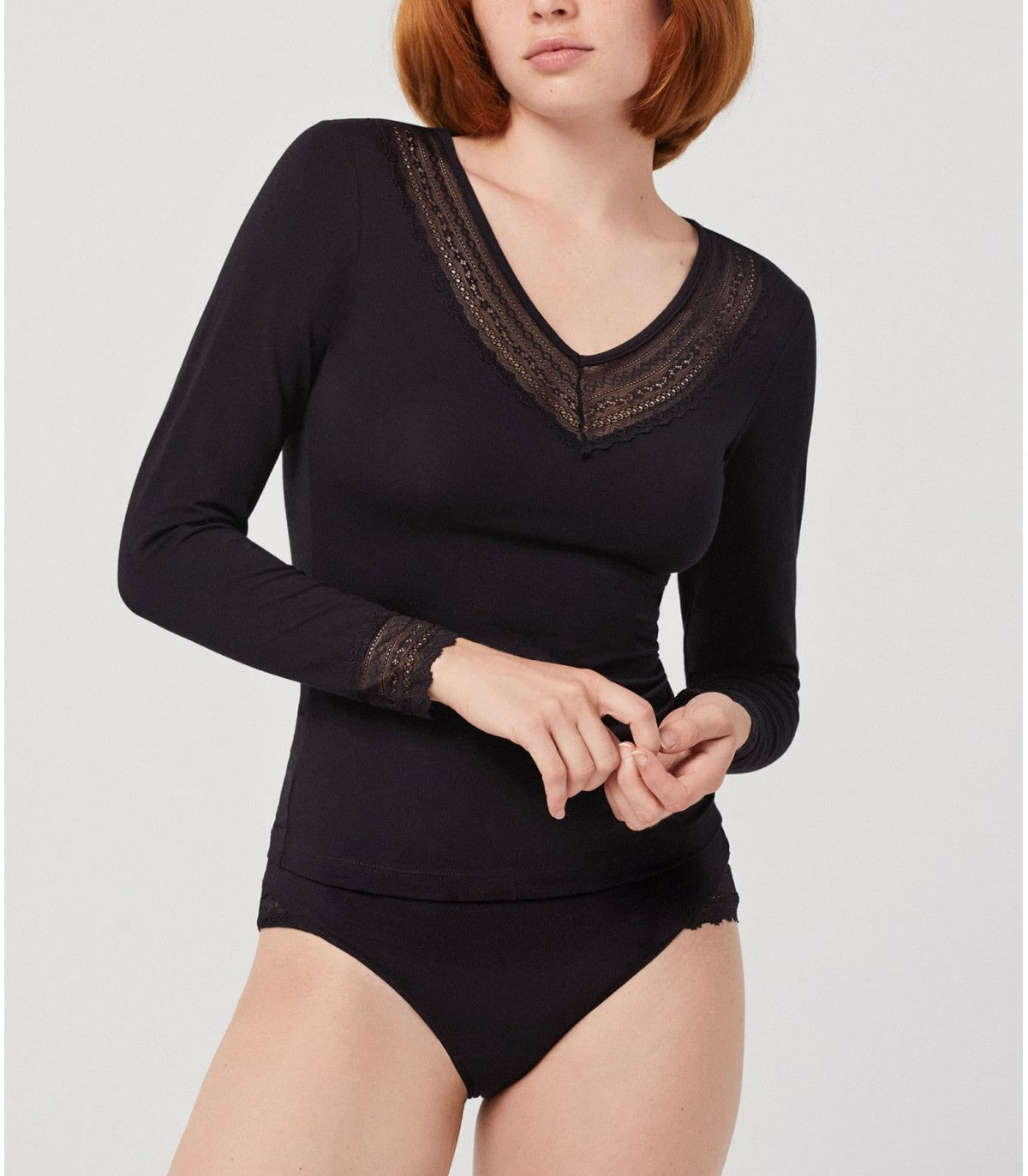 Ysabel Mora 19250 Lace Trim Top - Soft and warm long sleeved black vest top with a lace trim v-neck and lace trim cuffs.