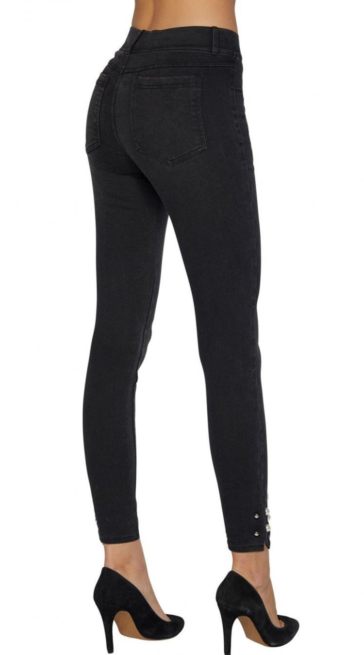 Ysabel Mora 70246 Black Jeggings - Mid rise denim leggings with a side slit opening cuff, pearl pin closer with silver stud end, rear pockets, belt loops and faux front pocket and fly stitching.